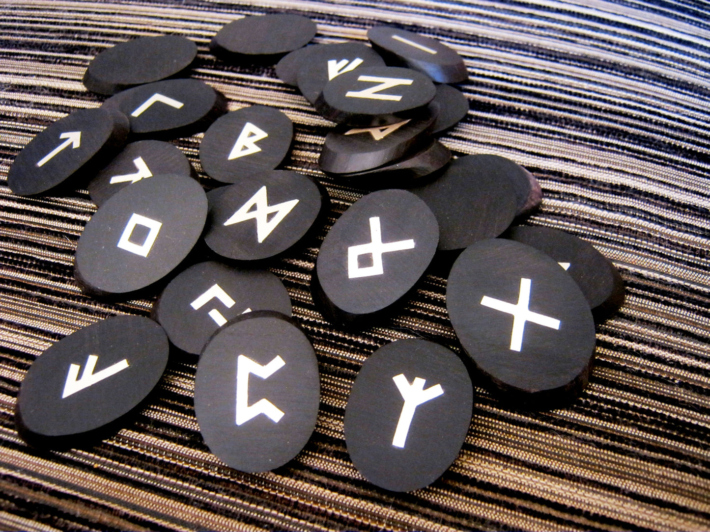 African Ebony wooden runes with silver inlay